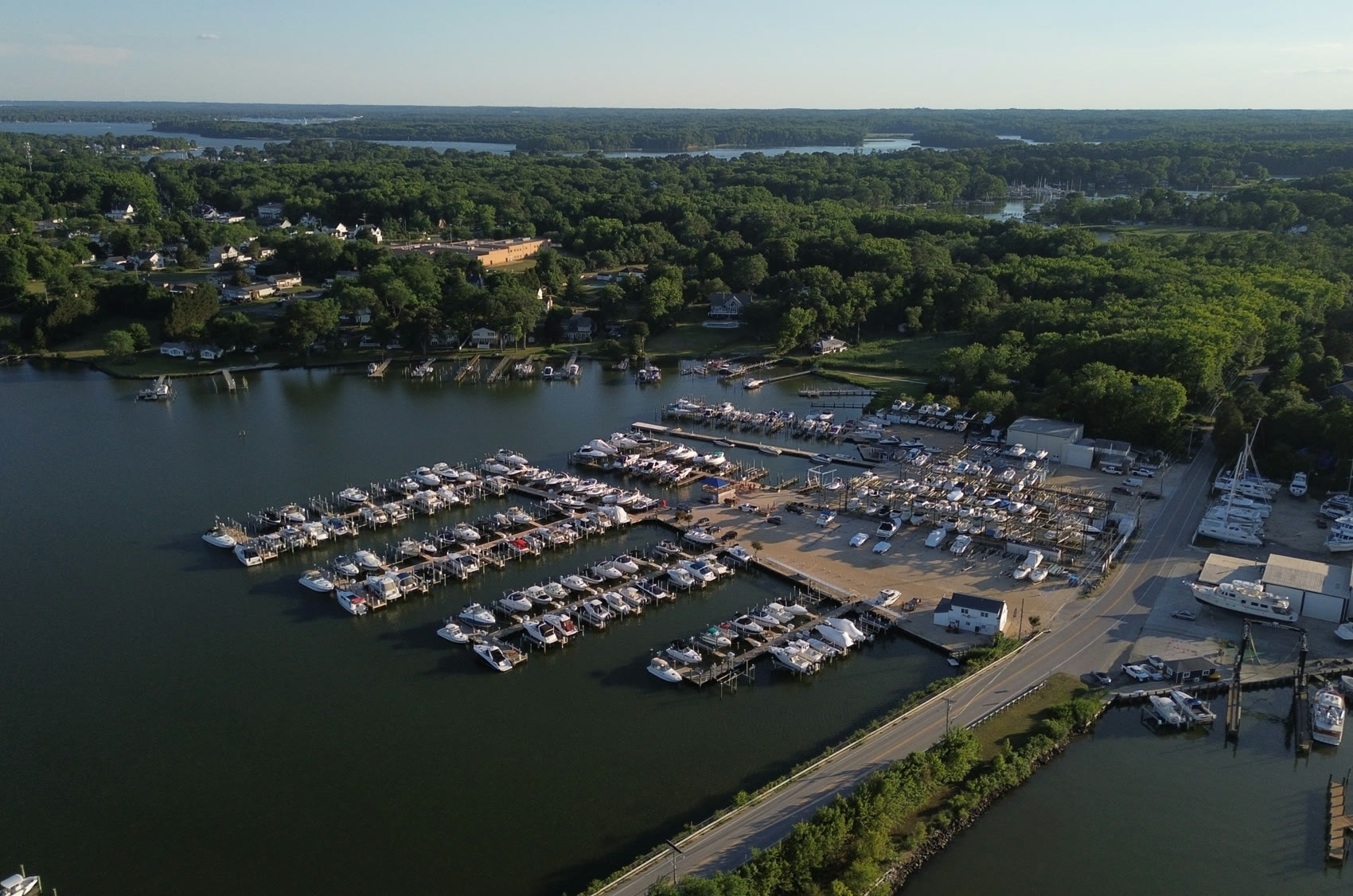 Aerial view of South River Marina showing the slips, dry stack storage yard, and service buildings